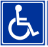 Tytuł: piktogram przedstawiający osobę na wózku inwalidzkim — opis: Oznaczenie lokalu dostosowanego do potrzeb wyborców niepełnosprawnych, pozbawionego barier architektonicznych.
